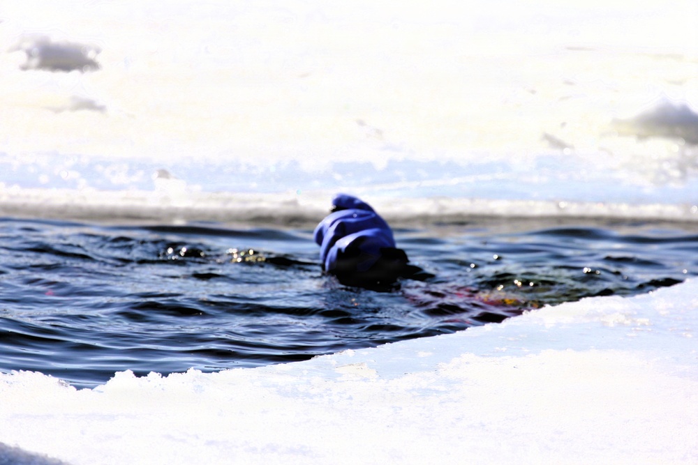 Fort McCoy firefighters practice diving under ice at post’s Big Sandy Lake during February 2026 training