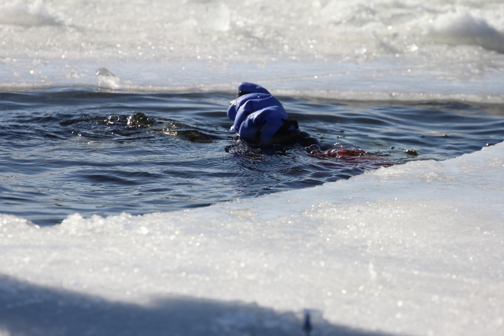 Fort McCoy firefighters practice diving under ice at post’s Big Sandy Lake during February 2026 training