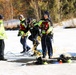 Fort McCoy firefighters practice diving under ice at post’s Big Sandy Lake during February 2026 training