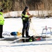 Fort McCoy firefighters practice diving under ice at post’s Big Sandy Lake during February 2026 training