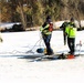 Fort McCoy firefighters practice diving under ice at post’s Big Sandy Lake during February 2026 training
