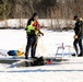 Fort McCoy firefighters practice diving under ice at post’s Big Sandy Lake during February 2026 training