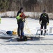 Fort McCoy firefighters practice diving under ice at post’s Big Sandy Lake during February 2026 training