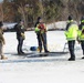Fort McCoy firefighters practice diving under ice at post’s Big Sandy Lake during February 2026 training