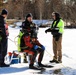 Fort McCoy firefighters practice diving under ice at post’s Big Sandy Lake during February 2026 training