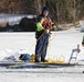 Fort McCoy firefighters practice diving under ice at post’s Big Sandy Lake during February 2026 training