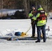 Fort McCoy firefighters practice diving under ice at post’s Big Sandy Lake during February 2026 training