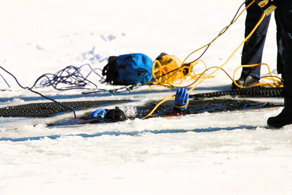 Fort McCoy firefighters practice diving under ice at post’s Big Sandy Lake during February 2026 training