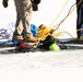 Fort McCoy firefighters practice diving under ice at post’s Big Sandy Lake during February 2026 training