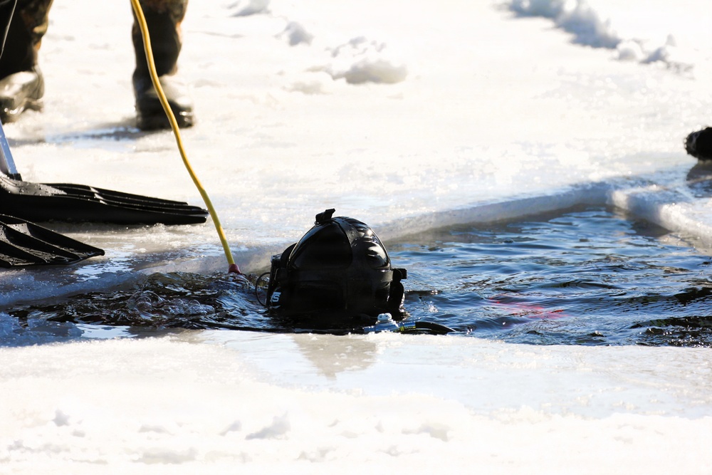 Fort McCoy firefighters practice diving under ice at post’s Big Sandy Lake during February 2026 training