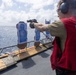 USS Iwo Jima Sailors Conduct A Live Fire Exercise