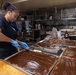 USS Iwo Jima Sailors Prepare Food for the Crew
