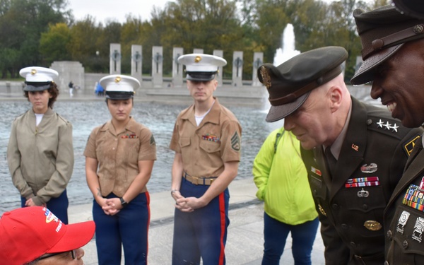 LTG John Morrison Jr., the Deputy Chief of Staff, G-6, speaks to a group of Honor Flight Service Members at the World War II Memorial