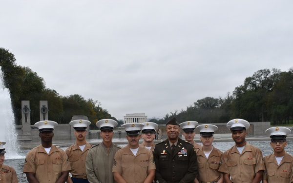 LTG John Morrison Jr., the Deputy Chief of Staff, G-6, speaks to a group of Honor Flight Service Members at the World War II Memorial