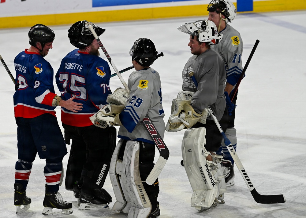 104th Fighter Wing Hockey Team celebrates 50th Anniversary, faces off in fourth “Battle of the Bases” against 103rd Airlift Wing