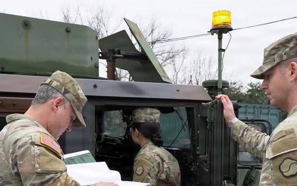 Convoy leaders conduct final movement checks
