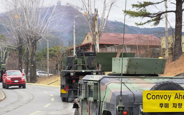 Rear security vehicle maintains convoy integrity on public roadway