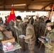 Wideshot of soldiers receiving chow at 35th ADA State of Brigade.