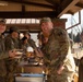 Soldiers receive food from State of BDE chow detail