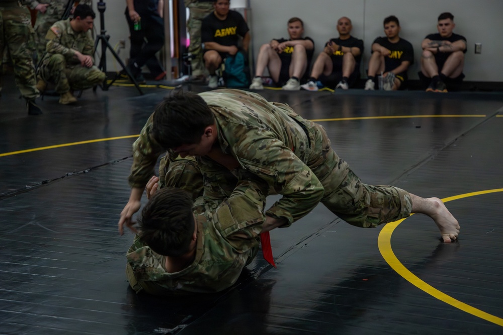 1st Armored Division Soldiers compete in Torch Week Combatives Competition Day