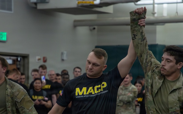 1st Armored Division Soldiers compete in Torch Week Combatives Competition Day