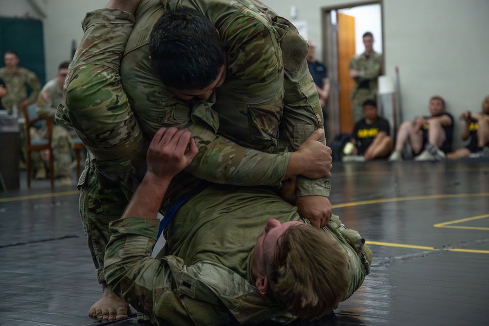 1st Armored Division Soldiers compete in Torch Week Combatives Competition Day
