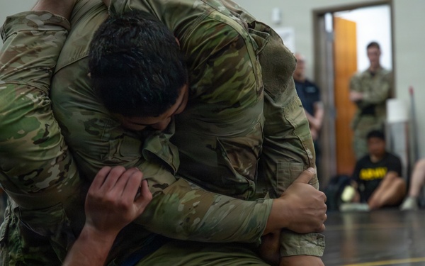 1st Armored Division Soldiers compete in Torch Week Combatives Competition Day