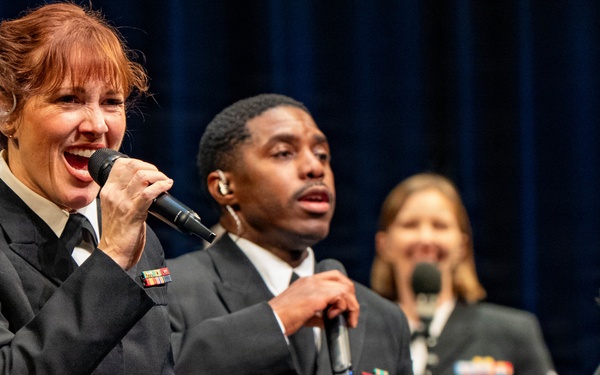 Chief Musician Maia Rodriguez performs at the Patriots Theatre at Trenton War Memorial during the US Navy Bands Sea Chanters National Tour