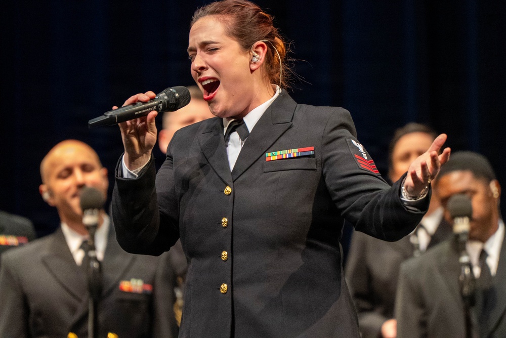 Musician 1st Class Michaela Ford performs at the Patriots Theatre at Trenton War Memorial during the US Navy Bands Sea Chanters National Tour