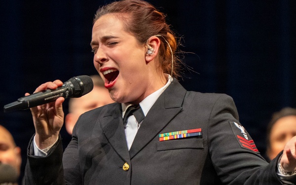 Musician 1st Class Michaela Ford performs at the Patriots Theatre at Trenton War Memorial during the US Navy Bands Sea Chanters National Tour