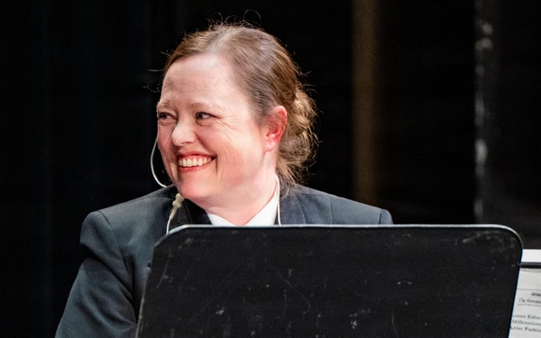Senior Chief Musician Caroline Evans performs at the Patriots Theatre at Trenton War Memorial during the US Navy Bands Sea Chanters National Tour