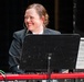 Senior Chief Musician Caroline Evans performs at the Patriots Theatre at Trenton War Memorial during the US Navy Bands Sea Chanters National Tour