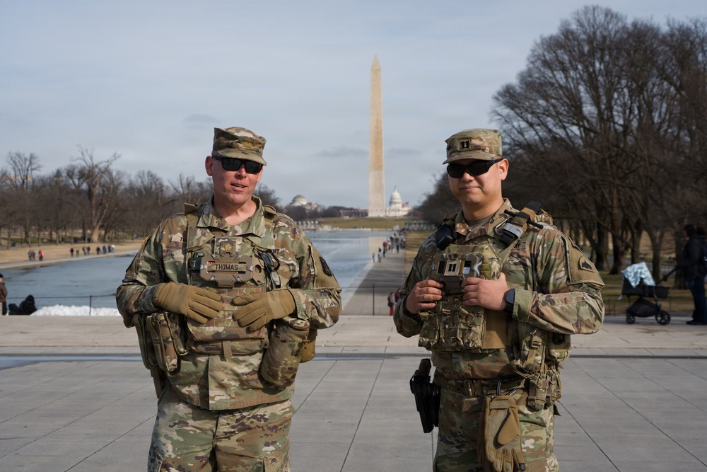 National Guard Soldiers patrol in front of the Lincoln Memorial