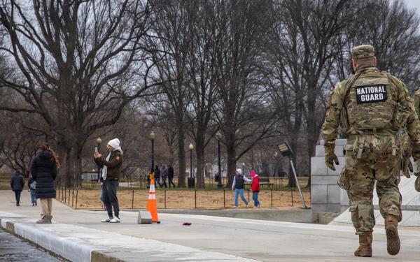 Mississippi National Guard Soldiers patrol in front of the Lincoln Memorial Reflecting Pool