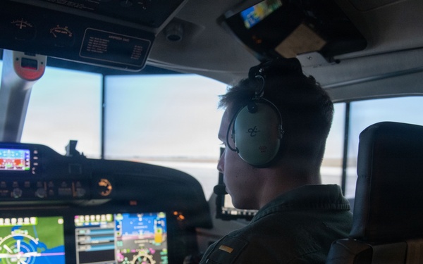 Student Naval Aviator Trains Using Simulators