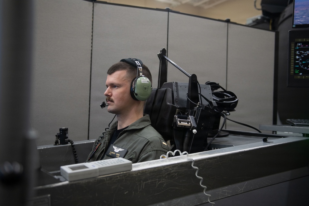 Student Naval Aviator Trains Using Simulator