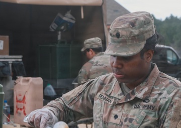 3rd Special Forces Group (Airborne) Soldier compete in the U.S. Army’s Philip A. Connelly Culinary Competition