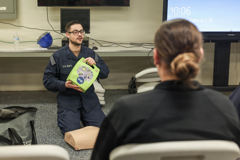 John F. Kennedy Conducts CPR Class