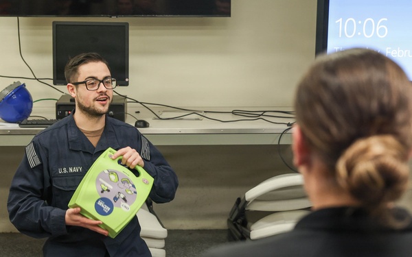 John F. Kennedy Conducts CPR Class