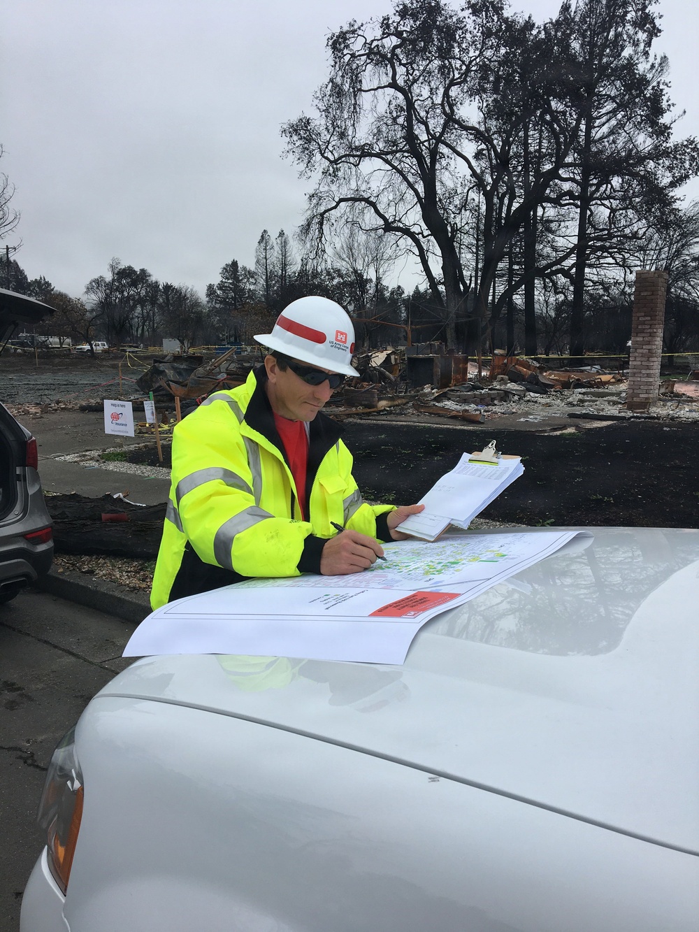 Jeff McCrery conducts potable water quality assessments on contractor-installed lines during the construction of a temporary housing site while deployed in response to Hurricanes Charlie and Ivan in Southeast Florida in December, 2004.