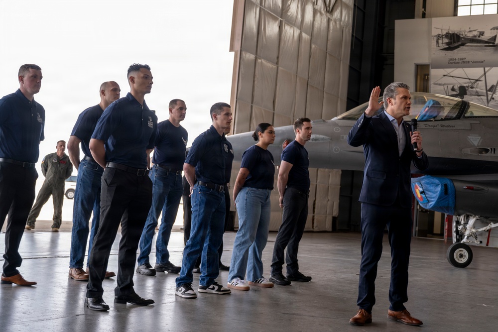 Secretary of War administers oath of enlistment to 140th Wing Airmen