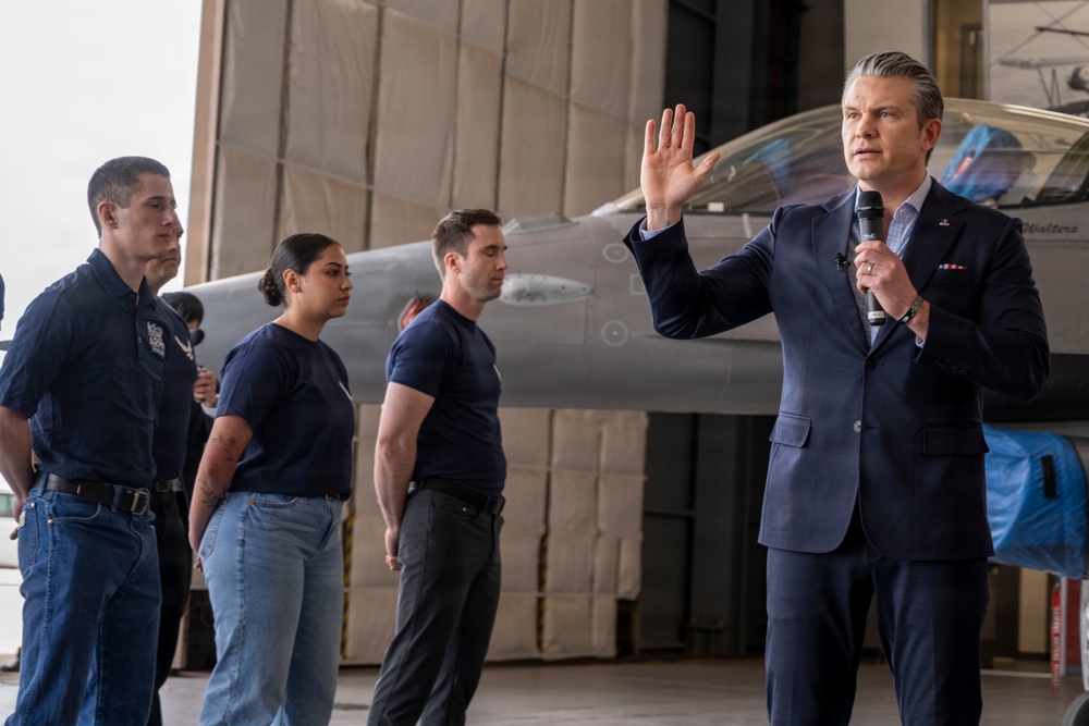 Secretary of War administers oath of enlistment to 140th Wing Airmen