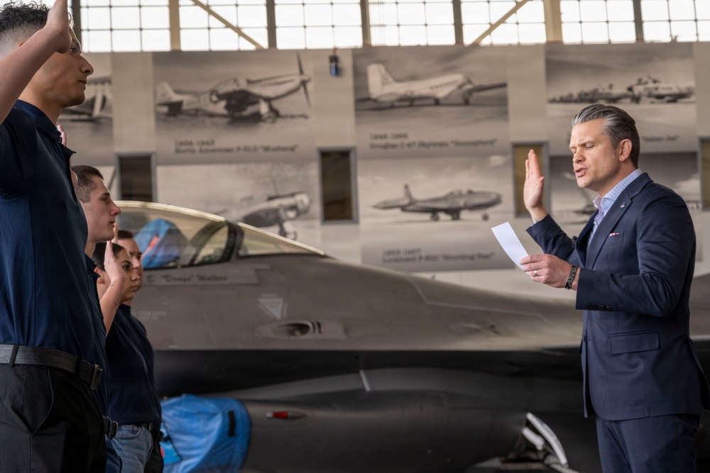 Secretary of War administers oath of enlistment to 140th Wing Airmen