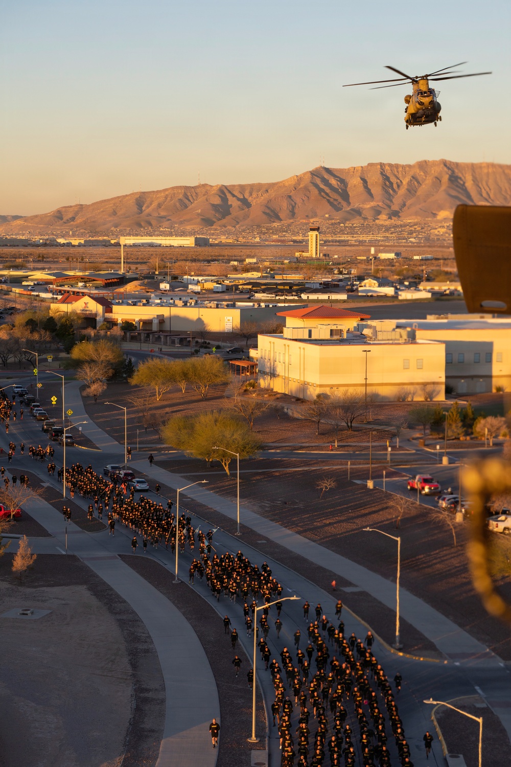 Combat Aviation Brigade, 1st Armored Division soars over division run