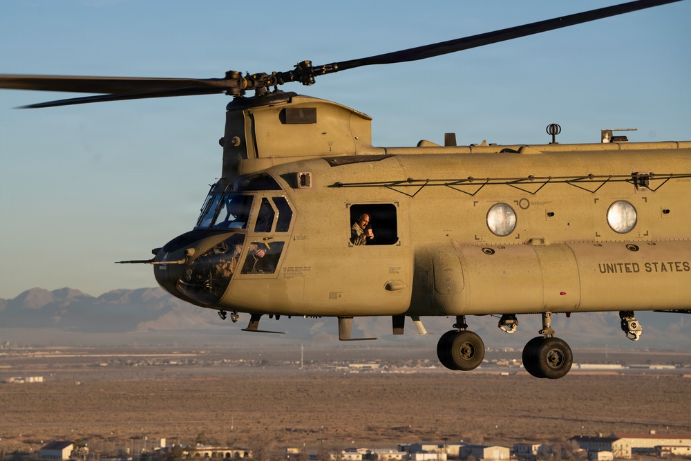 Combat Aviation Brigade, 1st Armored Division soars over division run
