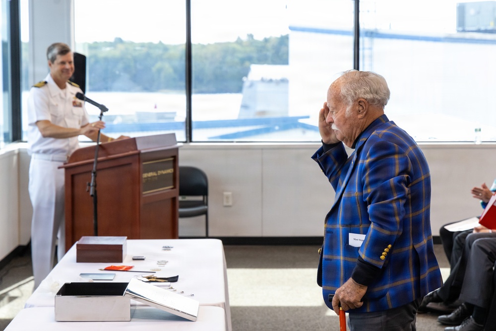 Mast stepping ceremony at Bath Iron Works for the future USS Louis H. Wilson, Jr. (DDG 126)