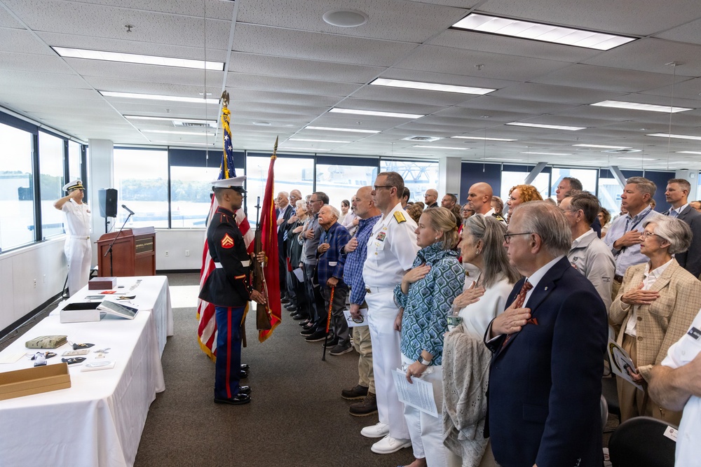 Mast stepping ceremony at Bath Iron Works for the future USS Louis H. Wilson, Jr. (DDG 126)