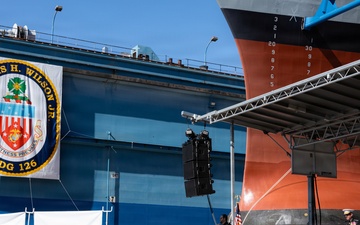 Christening ceremony of the future USS Louis H. Wilson, Jr. (DDG 126)