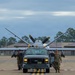 MQ-9 Reaper escorted for AGM-114 Hellfire loading during Sentry South 26-2