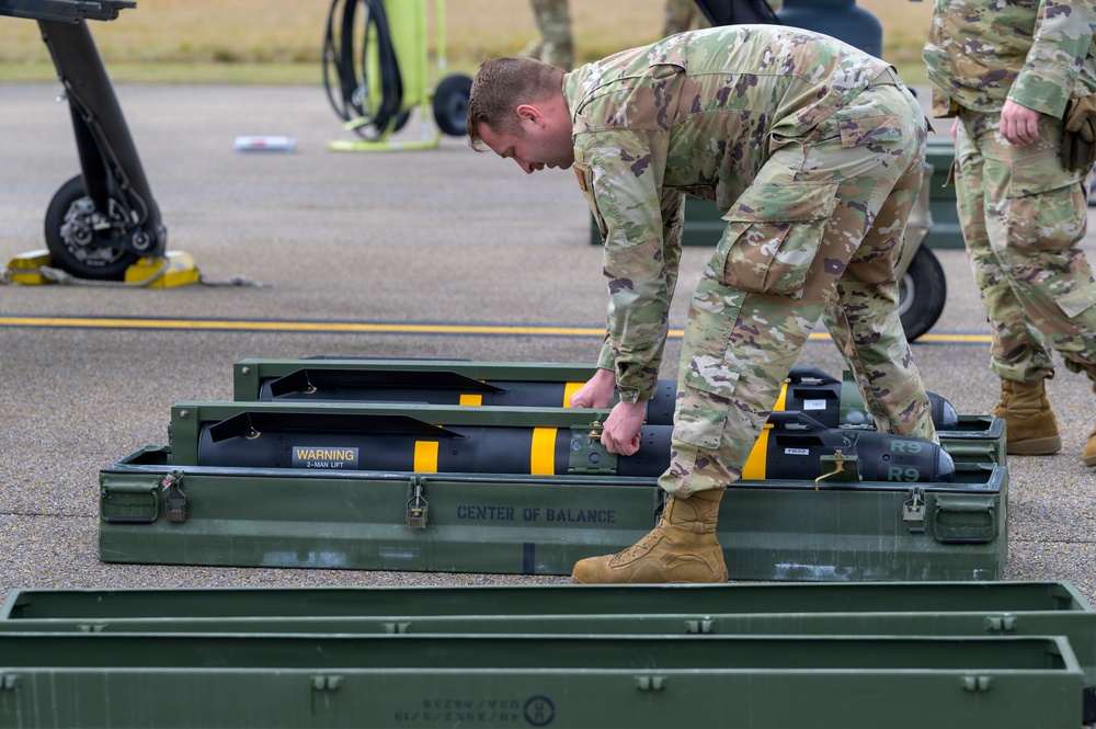 174th Attack Wing weapons specialist unloads AGM-114 Hellfire during Sentry South 26-2